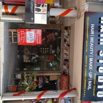 Studio front with offers